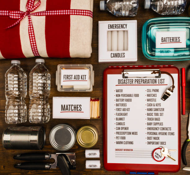 flat lay of a collection of items for disaster preparedness and emergency planning - first aid audio imagens e fotografias de stock