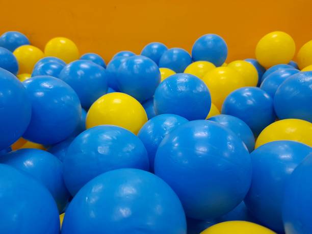 istock small blue and yellow plastic ball 1369237939