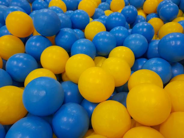 istock small blue and yellow plastic ball 1369237980