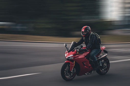 an image of a motorbiker moving very fast.  taken at Upper Hanover Street, Sheffield. United Kingdom - 22 September 2021