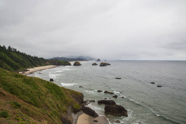 istock sunsets and sunrises are much better when youre by the beach and cliffs. 1369243341