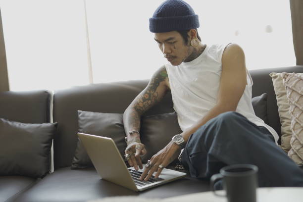 istock Young artist sitting on the sofa. 1369243442