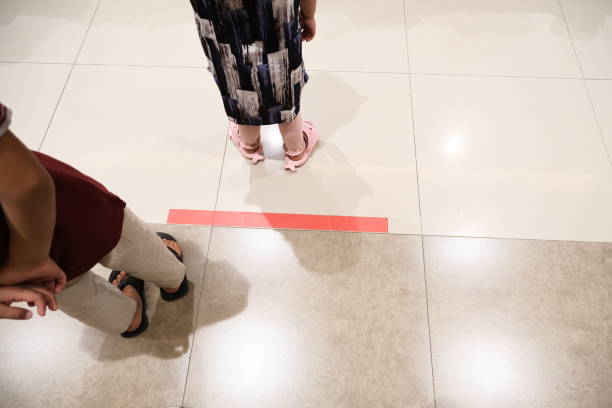 istock waiting in line for payment 1369244371