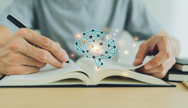 istock Student writing and reading book. Business and education idea concept 1369247659