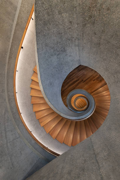 istock Modern spiral staircase. Contemporary architecture abstract background 1369251901