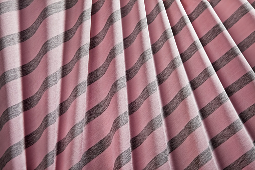 Crumpled striped pink texture background