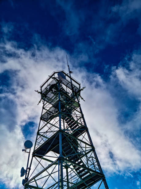 istock Snowy landscape, observation tower on the blue mountain 1369254073