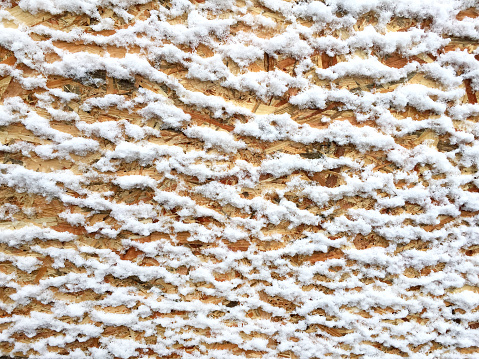 Snow background on wood