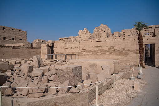 Ancient Temple of Karnak in Luxor - Ruined Thebes Egypt. Walls, obelisks and statutes at Karnak Temple. Temple of Amon-Ra