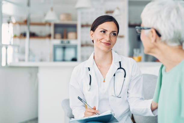 istock Doctor consulting a senior patient 1369260293