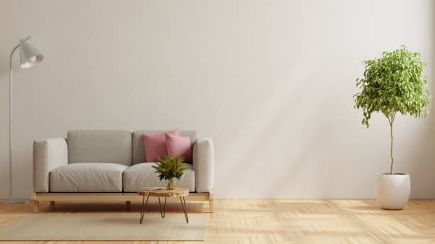 istock Living room interior wall mockup with sofa and table on white background. 1369261911