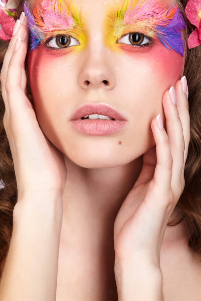 istock Female with fashion feather eyelashes make-up 1369261922