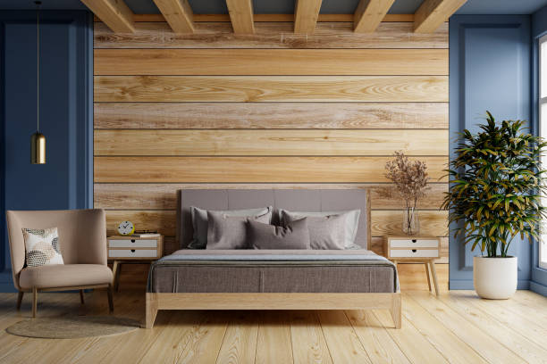 istock Blue bedroom interior mockup with gray bed on empty wooden wall background. 1369261981