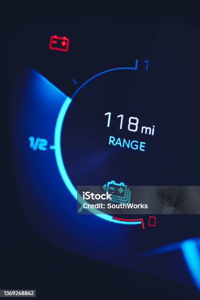 Closein Shot Of Electric Car Battery Range Gauge Stock Photo - Download Image Now - Electric Vehicle, Electric Car, High Angle View
