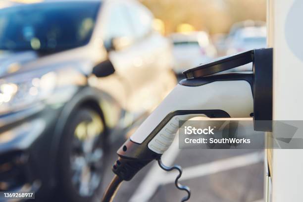 Electric Car Charging Point With Copy Space Stock Photo - Download Image Now - High Angle View, Station, Charging