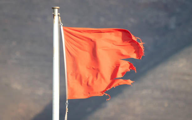 istock Red flag warning on beach in Spain 1369270455