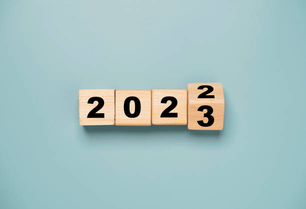 Wooden block cube flipping between 2022 to 2023 for change and preparation merry Christmas and happy new year. Wooden block cube flipping between 2022 to 2023 for change and preparation merry Christmas and happy new year. new years stock pictures, royalty-free photos & images