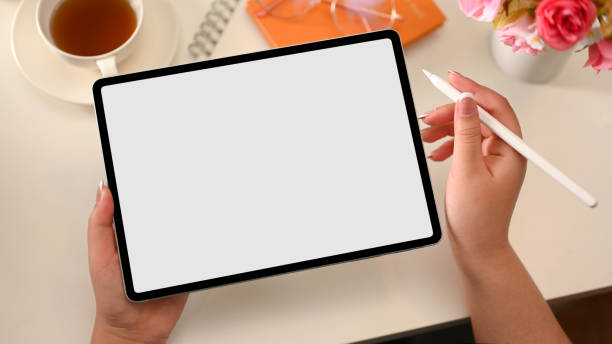 istock A female designer using stylus pen to sketch her graphic on digital tablet 1369271874