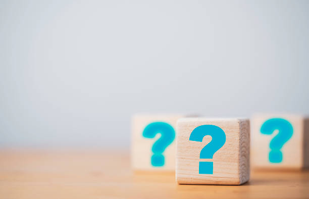 istock Blue  equation mark print screen on wooden cube block for creative Question and answer time concept. 1369274820