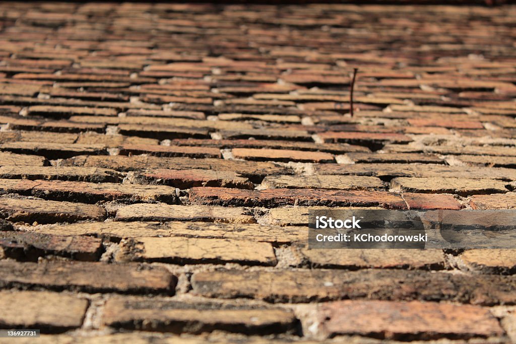 Old brickwall in the sun Brickwall texture Backgrounds Stock Photo