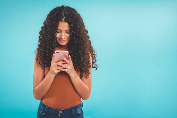 istock Teenager texting 1369277852