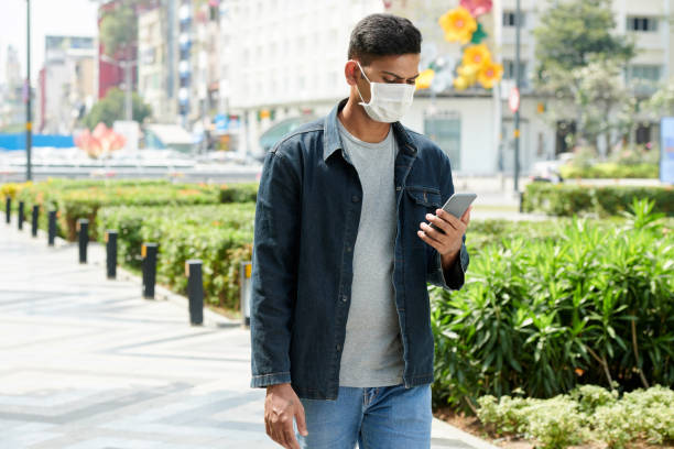 istock Man Reading Comments on Social Media 1369278987