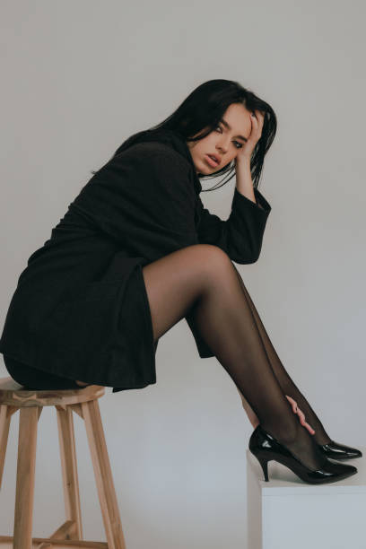 istock Young woman wearing black tights 1369279697