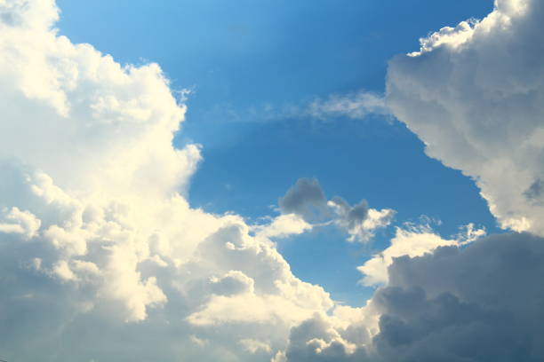 istock Beautiful blue sky and white big cumulus clouds. Background. Landscape. 1369279856