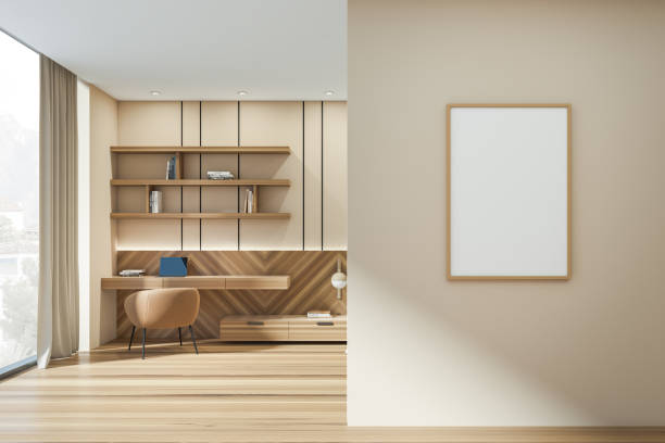 istock Workplace interior with table and armchair near window. Mockup poster 1369280384