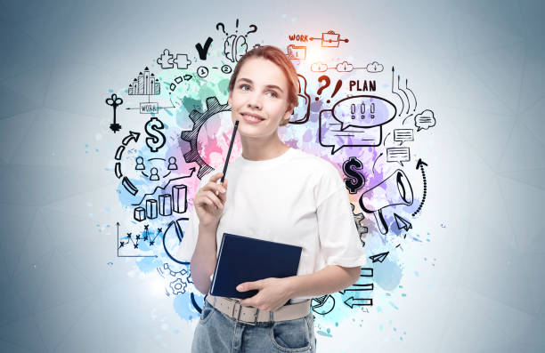 istock Woman with notebook and business sketch 1369282720