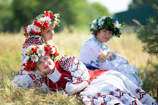 Belarus, Aftyuki village, July 31, 2021. Ethnic holiday. Beautiful Belarus or Ukrainian women in national clothes.