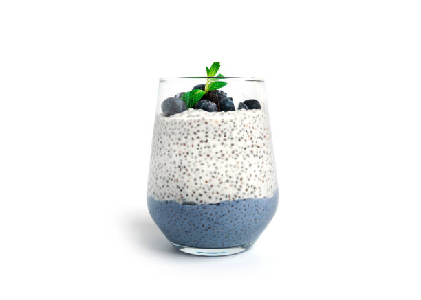 istock Chia pudding with blueberries isolated on white background. Chia pudding, mint and blueberries 1369285532