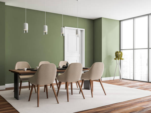 istock Corner view of green, beige and white dining room 1369285555