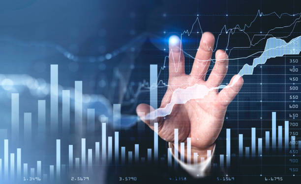 istock Businessman wearing formal suit is touching digital screen 1369286017