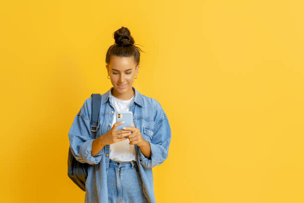 istock young woman on bright color background 1369286840
