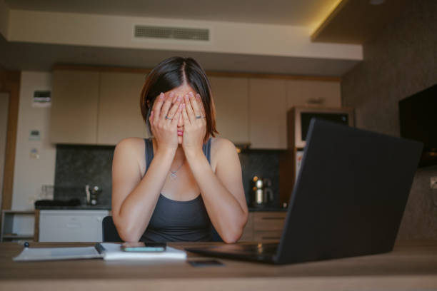 istock young asian woman at home, remote work 1369288836
