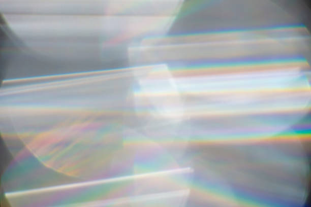 istock Rainbow Lens. Optical glare effect of objective lenses. Defocused blur reflection of rainbow sunbeams. 1369288843