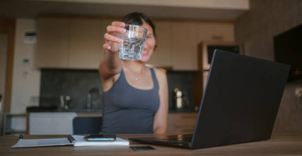 istock young asian woman at home, remote work 1369288858