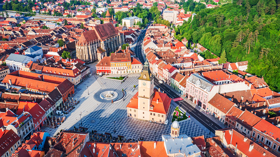 Brasov, Romania - Aerial drone view of Council Square and Black Church, medieval city in  Transylvania, Eastern Europe.