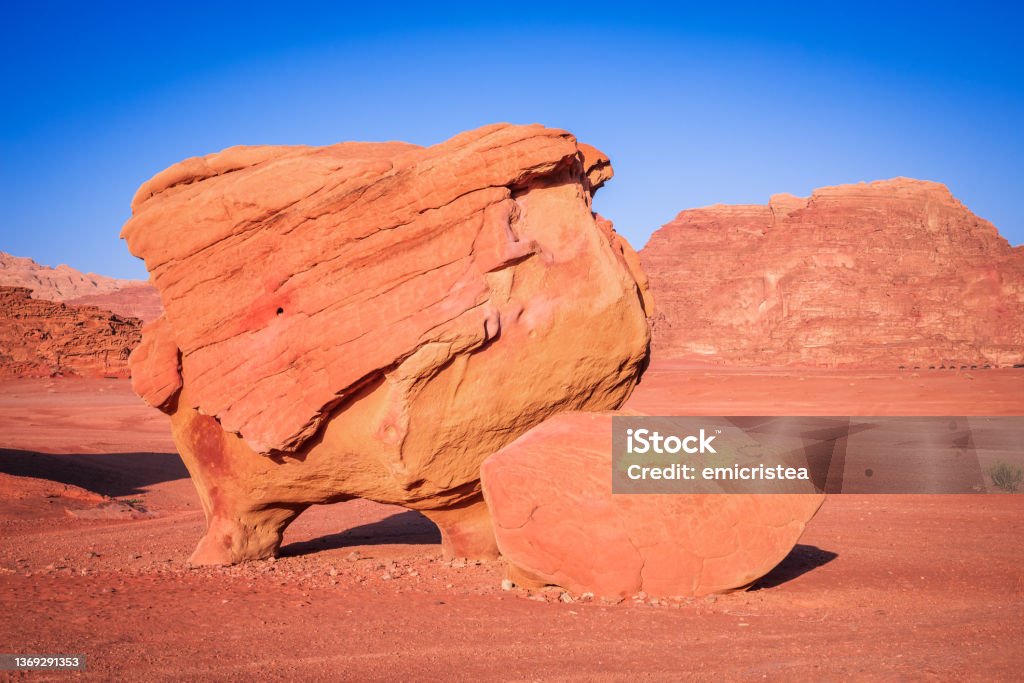 Wadi Rum, Jordan - Natural sandstone rock - Chicken Rock Wadi Rum, Jordan. Natural sandstone rock formation known as Chicken Rock (aka Cow Rock), Aqaba Governorate, Middle East. Adventure Stock Photo