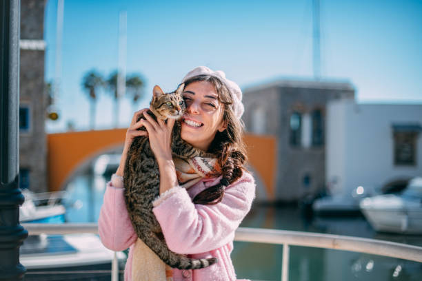 istock Cute Woman and Tabby Cat 1369291518