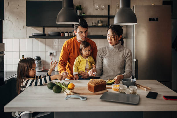 istock Family in kitchen at home 1369291781