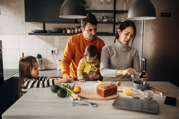istock Family in kitchen at home 1369291805