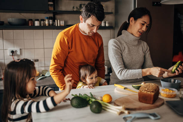 istock Family in kitchen at home 1369291829
