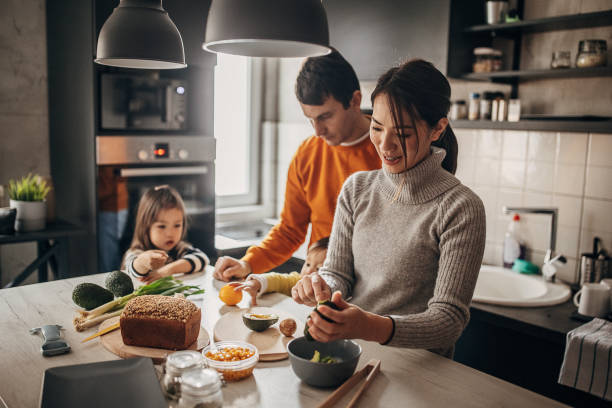 Family in kitchen at home