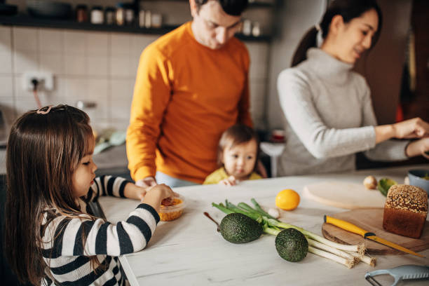 istock Family in kitchen at home 1369292403