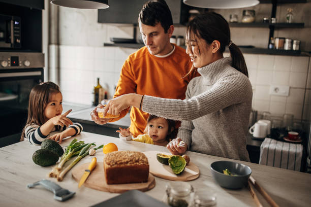 istock Family in kitchen at home 1369292434