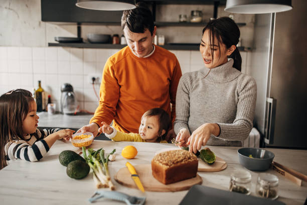 istock Family in kitchen at home 1369292511