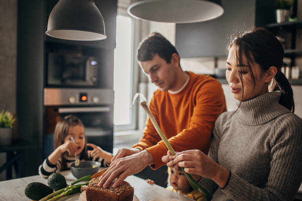 istock Family in kitchen at home 1369292686