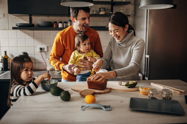 istock Family in kitchen at home 1369292804